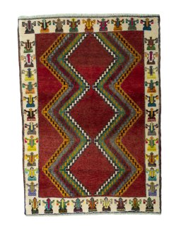 Full view of 2000s Persian Gabbeh rug from Iran / Persia, 152 × 108 cm in Red tones