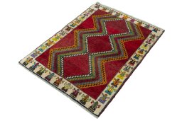 Corner detail of 2000s Persian Gabbeh rug showing border pattern and Wool pile