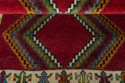 Full view of 2000s Persian Gabbeh rug from Iran / Persia, 152 × 108 cm in Red tones