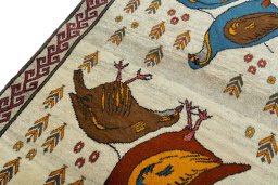 Backside of handmade 2000s Persian Gabbeh rug showing knot structure and weave density