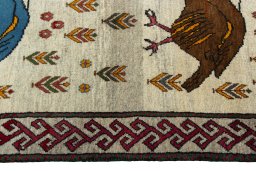 Close-up detail of 2000s Persian Gabbeh rug from Iran / Persia showing Wool weave