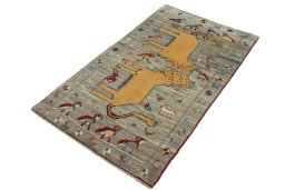 Corner detail of 2000s Persian Gabbeh rug showing border pattern and Wool pile