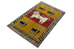 Corner detail of 2000s Persian Gabbeh rug showing border pattern and Wool pile