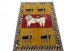 Surface texture of 2000s Persian Gabbeh rug with natural Wool and intricate pattern
