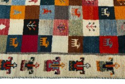 Close-up detail of 2000s Persian Gabbeh rug from Iran / Persia showing Wool weave