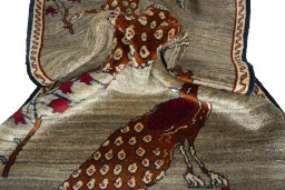 Corner detail of 2000s Persian Gabbeh rug showing border pattern and Wool pile