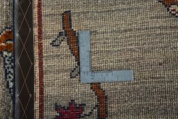 Close-up detail of 2000s Persian Gabbeh rug from Iran / Persia showing Wool weave