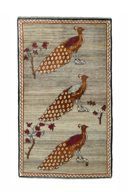 Full view of 2000s Persian Gabbeh rug from Iran / Persia, 176 × 105 cm in Beige tones