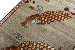Backside of handmade 2000s Persian Gabbeh rug showing knot structure and weave density
