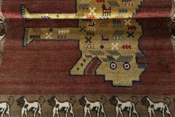 Full view of 2000s Persian Gabbeh rug from Iran / Persia, 152 × 107 cm in Red tones