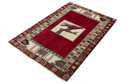Corner detail of 2000s Persian Gabbeh rug showing border pattern and Wool pile