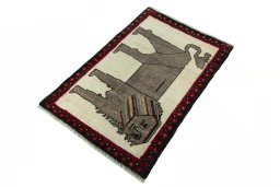 Corner detail of 2000s Persian Gabbeh rug showing border pattern and Wool pile
