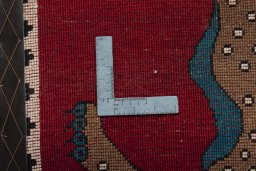 Full view of 2000s Persian Gabbeh rug from Iran / Persia, 93 × 63 cm in Red tones
