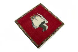 Close-up detail of 2000s Persian Gabbeh rug from Iran / Persia showing Wool weave