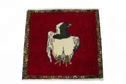 Surface texture of 2000s Persian Gabbeh rug with natural Wool and intricate pattern