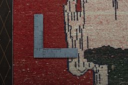 Backside of handmade 2000s Persian Gabbeh rug showing knot structure and weave density