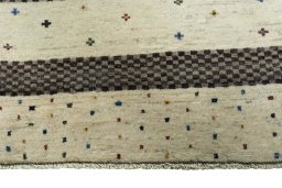Close-up detail of 2000s Persian Gabbeh rug from Iran / Persia showing Wool weave