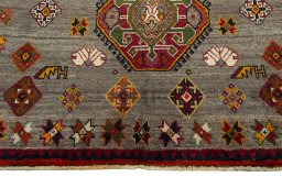 Central medallion detail of 2000s Persian Gabbeh rug from Iran / Persia