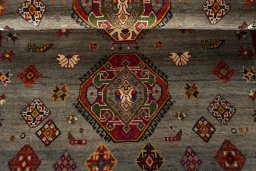 Full view of 2000s Persian Gabbeh rug from Iran / Persia, 200 × 132 cm in Beige tones