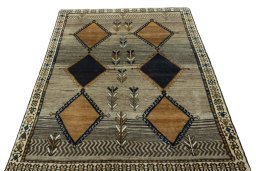 Surface texture of 1970s Persian Gabbeh rug with natural Wool and intricate pattern
