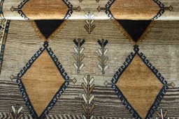 Full view of 1970s Persian Gabbeh rug from Iran / Persia, 190 × 135 cm in Beige tones