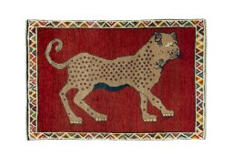 Full view of 2000s Persian Gabbeh rug from Iran / Persia, 144 × 95 cm in Red tones