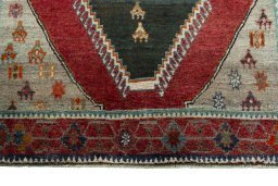 Central medallion detail of 2000s Persian Gabbeh rug from Iran / Persia