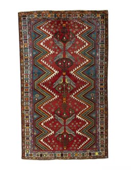 Full view of 2000s Persian Gabbeh rug from Iran / Persia, 252 × 149 cm in Red tones