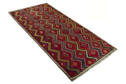 Close-up detail of 2000s Persian Gabbeh rug from Iran / Persia showing Wool weave