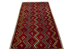 Surface texture of 2000s Persian Gabbeh rug with natural Wool and intricate pattern