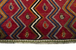 Central medallion detail of 2000s Persian Gabbeh rug from Iran / Persia