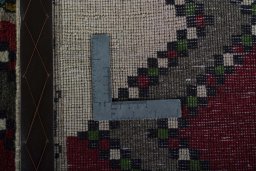 Close-up detail of 2000s Persian Gabbeh rug from Iran / Persia showing Wool weave