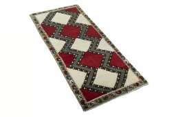 Close-up detail of 2000s Persian Gabbeh rug from Iran / Persia showing Wool weave