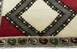 Central medallion detail of 2000s Persian Gabbeh rug from Iran / Persia