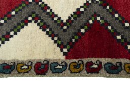 Close-up detail of 2000s Persian Gabbeh rug from Iran / Persia showing Wool weave