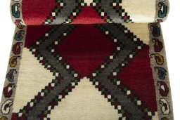 Full view of 2000s Persian Gabbeh rug from Iran / Persia, 147 × 66 cm in Beige tones