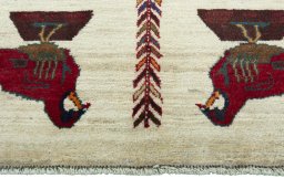 Central medallion detail of 2000s Persian Gabbeh rug from Iran / Persia