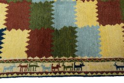 Close-up detail of 2000s Persian Gabbeh rug from Iran / Persia showing Wool weave