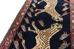 Backside of handmade 2000s Persian Gabbeh rug showing knot structure and weave density