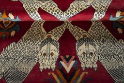 Corner detail of 2000s Persian Gabbeh rug showing border pattern and Wool pile