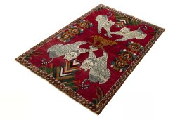 Corner detail of 2000s Persian Gabbeh rug showing border pattern and Wool pile