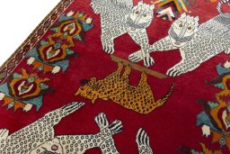 Backside of handmade 2000s Persian Gabbeh rug showing knot structure and weave density
