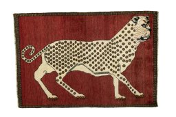 Full view of 2000s Persian Gabbeh rug from Iran / Persia, 152 × 102 cm in Red tones
