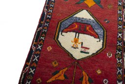 Backside of handmade 2000s Persian Gabbeh rug showing knot structure and weave density