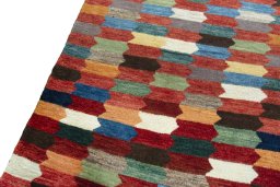 Backside of handmade New Persian Gabbeh rug showing knot structure and weave density