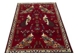 Surface texture of 2000s Persian Gabbeh rug with natural Wool and intricate pattern