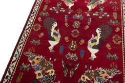Backside of handmade 2000s Persian Gabbeh rug showing knot structure and weave density