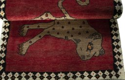 Full view of 2000s Persian Gabbeh rug from Iran / Persia, 128 × 85 cm in Red tones