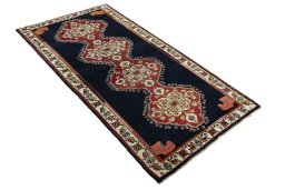 Close-up detail of 2000s Persian Gabbeh rug from Iran / Persia showing Wool weave