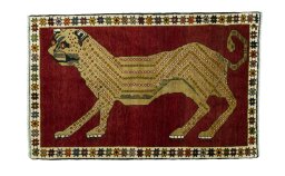 Full view of 2000s Persian Gabbeh rug from Iran / Persia, 158 × 100 cm in Red tones